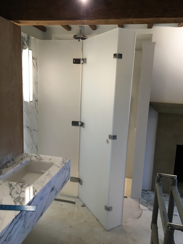 Bespoke frosted glass shower enclosure in Shepherd's Bush luxury bathroom